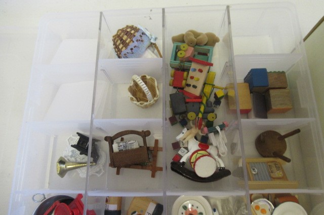 A large quantity of dolls house furniture and equipment Image