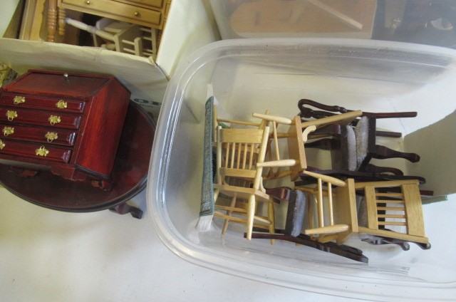 A large quantity of dolls house furniture and equipment Image