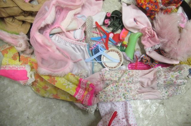 Seven Sindy dolls and a large quantity of clothing and equipment Image