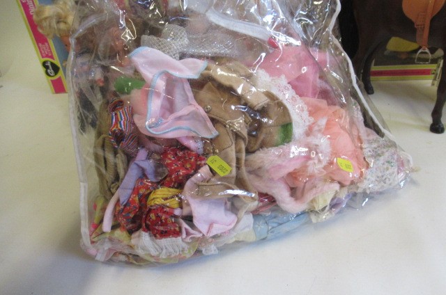 Seven Sindy dolls and a large quantity of clothing and equipment Image
