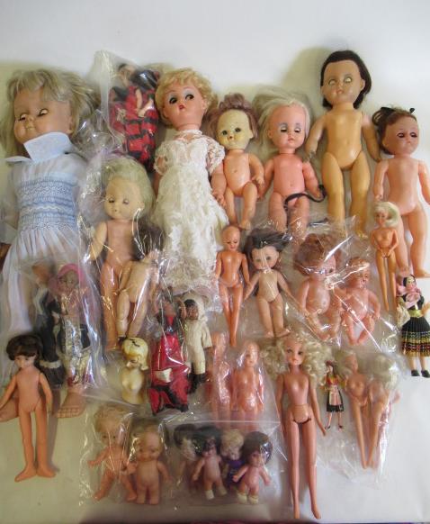 A quantity of late 20th century dolls Image