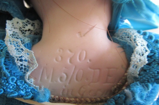 An Armand Marseille bisque shoulder head doll Image