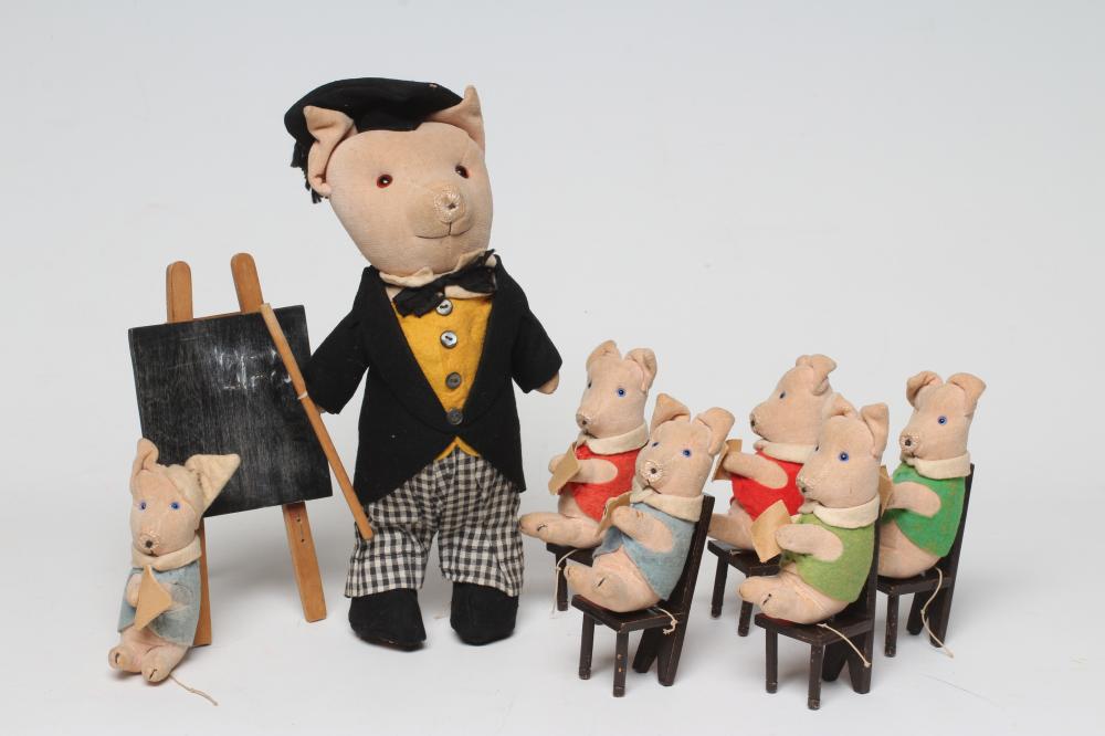 A pre-war Chad Valley pig school Image