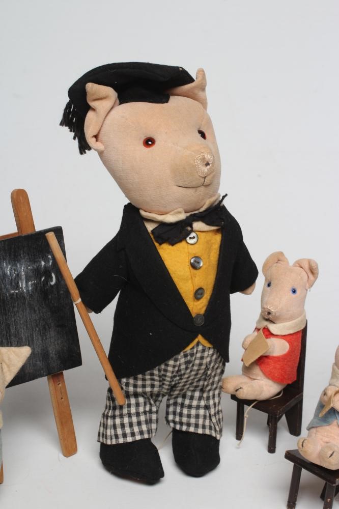 A pre-war Chad Valley pig school Image