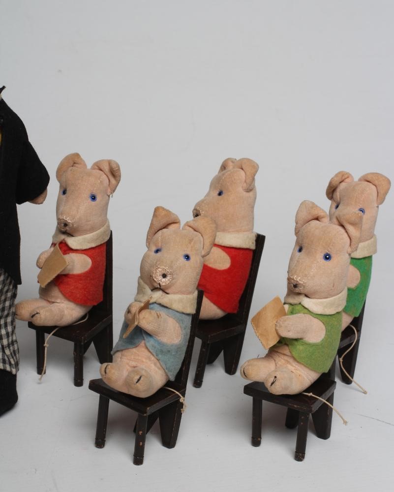 A pre-war Chad Valley pig school Image