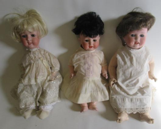 Three bisque socket head character dolls Image