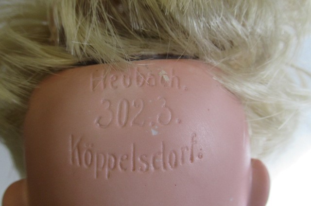 Three bisque socket head character dolls Image