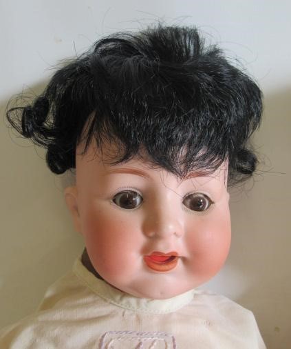 Three bisque socket head character dolls Image