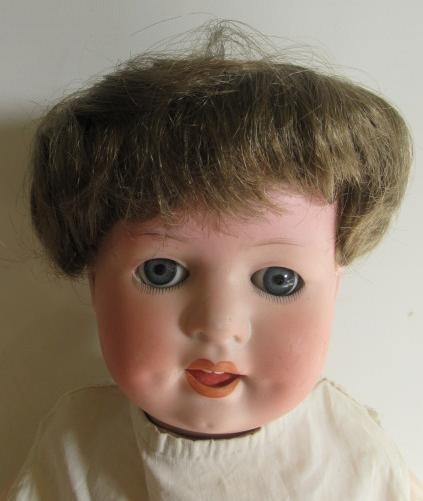 Three bisque socket head character dolls Image