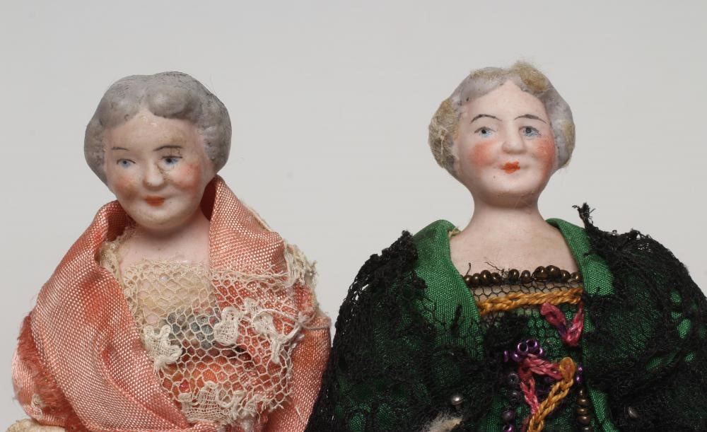 A pair of old lady bisque shoulder head dolls house dolls Image