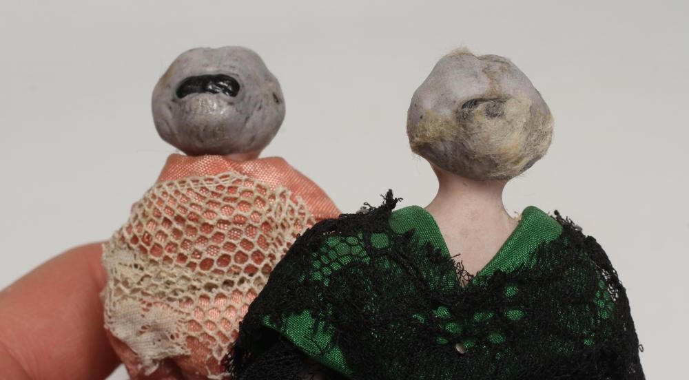 A pair of old lady bisque shoulder head dolls house dolls Image