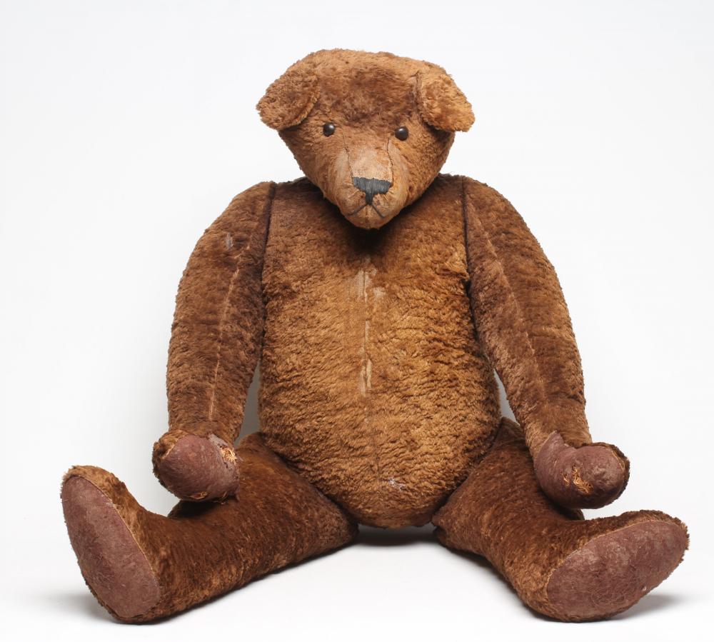 A very large straw filled teddy bear Image