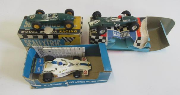 Three Scalextric race cars comprising Lotus Image
