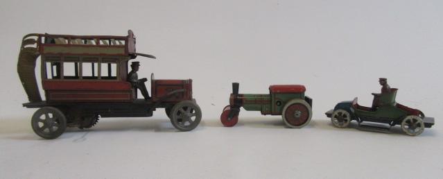 Clockwork General Open Top Bus marked Made in Germany and two Penny Toys car and road roller Image