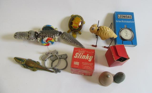 A quantity of small mechanical toys including clockwork crocodile Image
