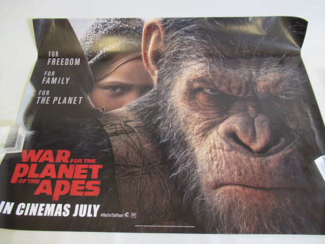 Three Star Treck posters and a "War for the Planet of the Apes" film poster Image