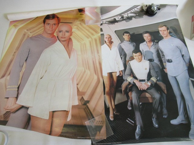 Three Star Treck posters and a "War for the Planet of the Apes" film poster Image