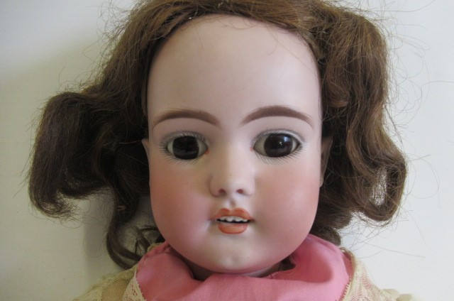 A Simon & Halbig bisque socket head doll Image