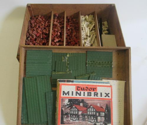 A PRMO Rubber Co. MiniBrix Building Set with interlocking rubber bricks contained in wooden box with Image