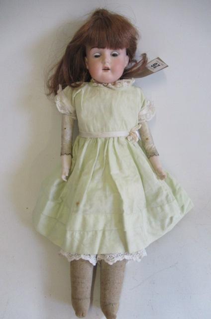 A Cuno & Otto Dressel bisque shoulder head doll Image
