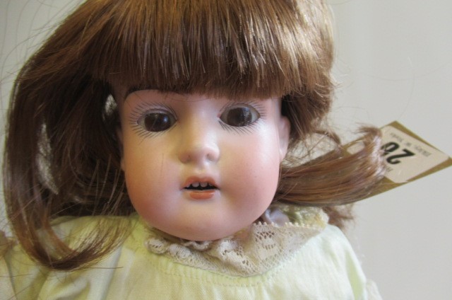 A Cuno & Otto Dressel bisque shoulder head doll Image