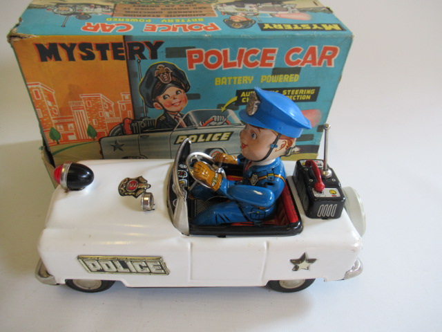 Nomura battery powered Bump-and-Go action police car Image