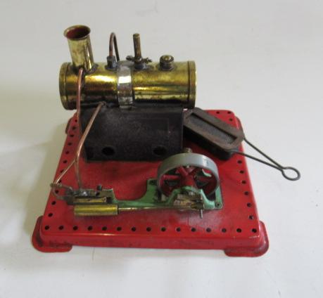 A Mamod spirit fired stationary steam engine with spirit burner Image