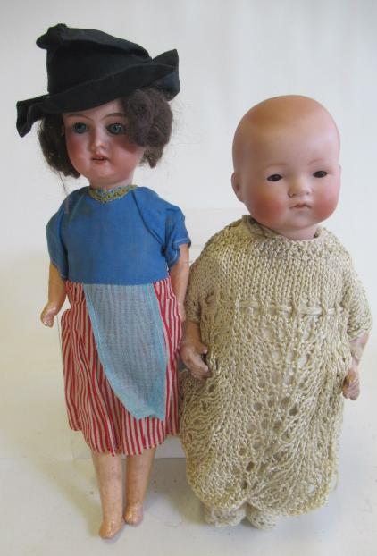 Two Armand Marseille bisque socket head dolls Image