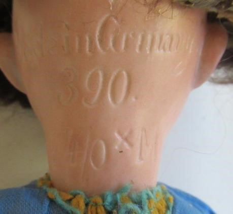 Two Armand Marseille bisque socket head dolls Image