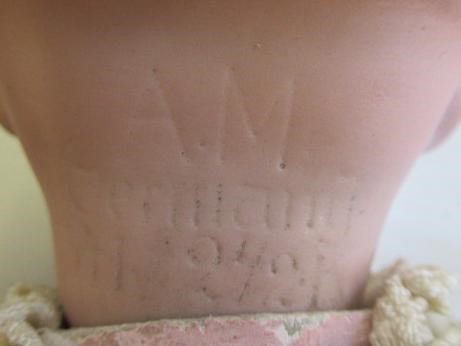 Two Armand Marseille bisque socket head dolls Image