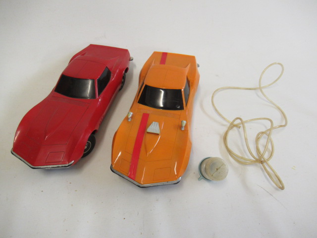 Two Eldon battery operated Corvette Stingray cars with pneumatic pump steering Image