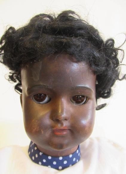 A Simon & Halbig mulatto girl bisque socket head doll Image