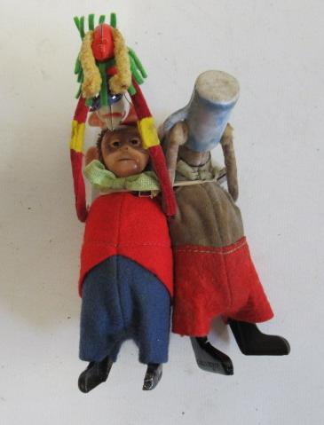 Schuco clockwork monkey with small dog in red coat and a clockwork mouse with tankard Image