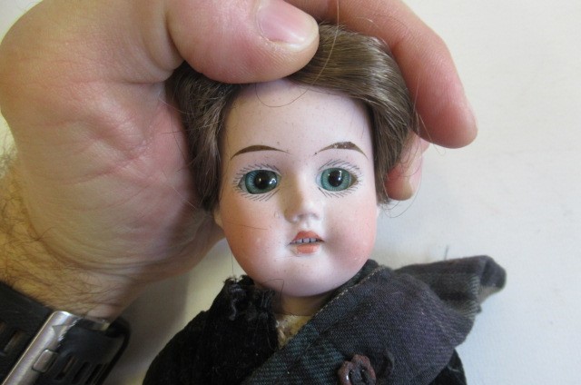 A Gebruder Knoch bisque socket head scotch doll Image