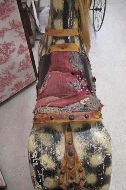 A carved wood rocking horse in dappled grey Image