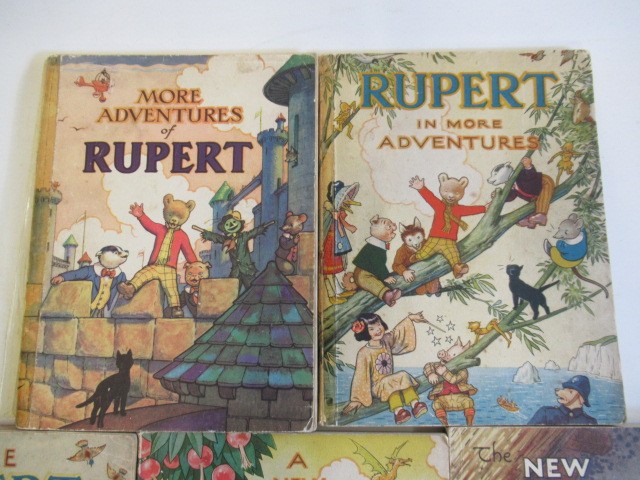 Five Rupert annuals comprising "A New Rupert Book" Image