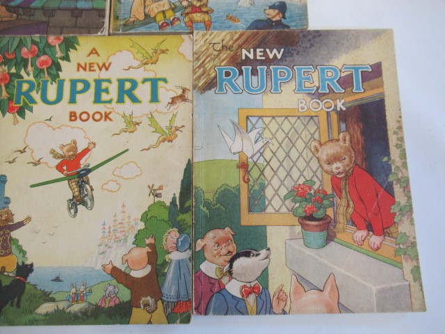 Five Rupert annuals comprising "A New Rupert Book" Image
