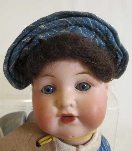 Three bisque head dolls Image