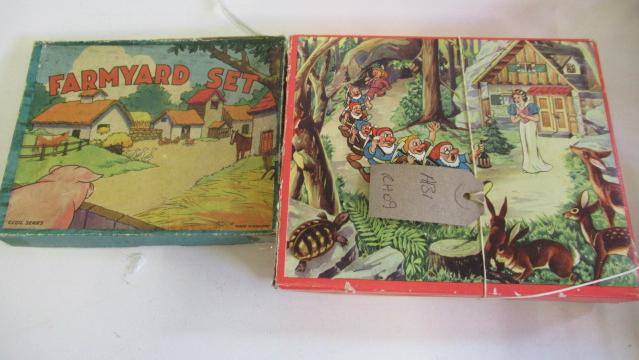Snow White wooden block puzzle and a semi-flats farmyard set with seven animals Image