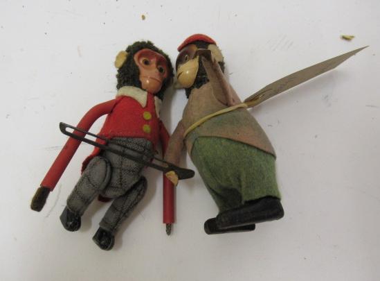 A pre-war Schuco tumbling clockwork monkey and monkey violinist (no violin) Image