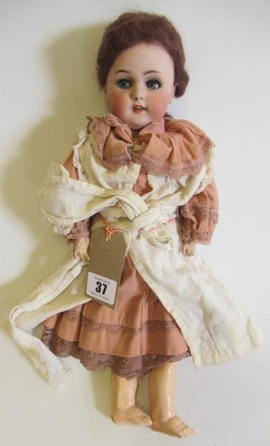 A Simon & Halbig bisque socket head doll Image