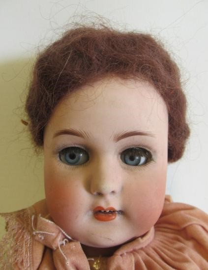 A Simon & Halbig bisque socket head doll Image