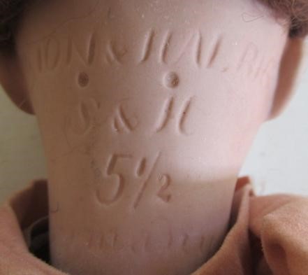 A Simon & Halbig bisque socket head doll Image