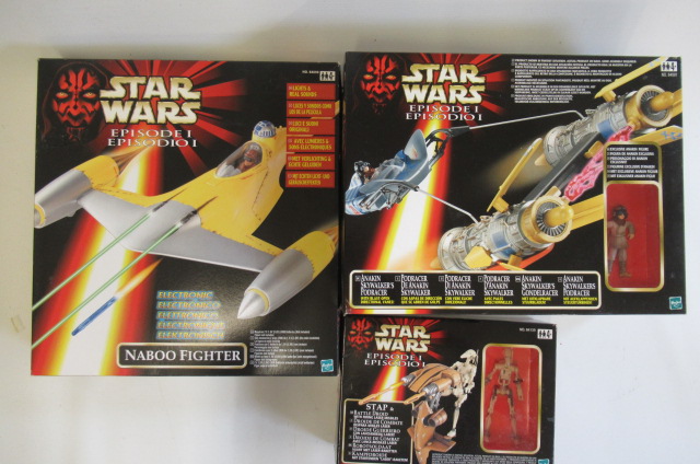 Three Hasbro Star Wars toys comprising Battle Droid with firing laser missiles Image