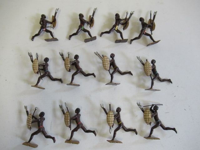 Twelve Britains African Zulu Warriors running with spears and clubs Image