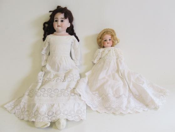 Two bisque shoulder head dolls Image
