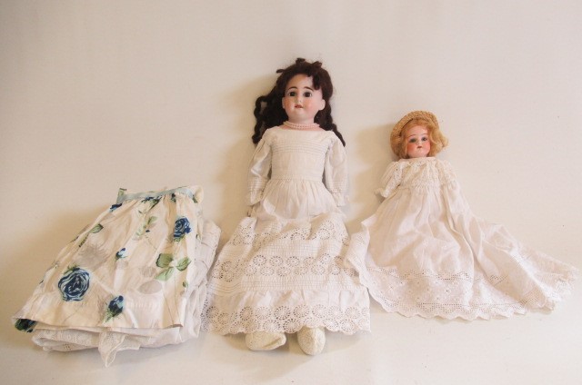 Two bisque shoulder head dolls Image