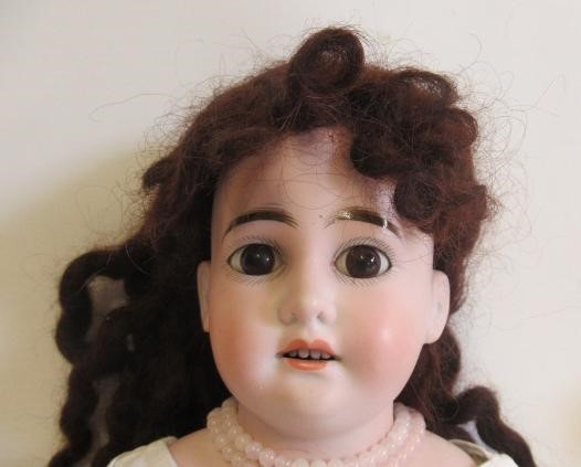 Two bisque shoulder head dolls Image