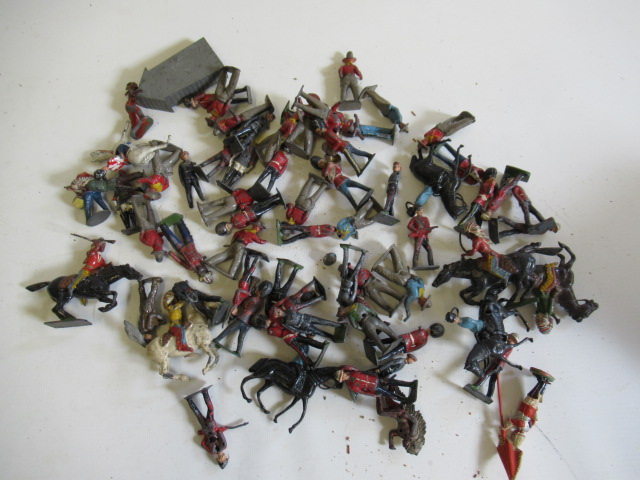 Playworn lead figures including Cowboys and Indians Image