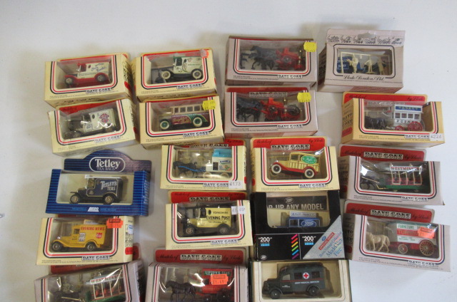 Twenty three Lledo Days Gone diecast vehicles including vans Image